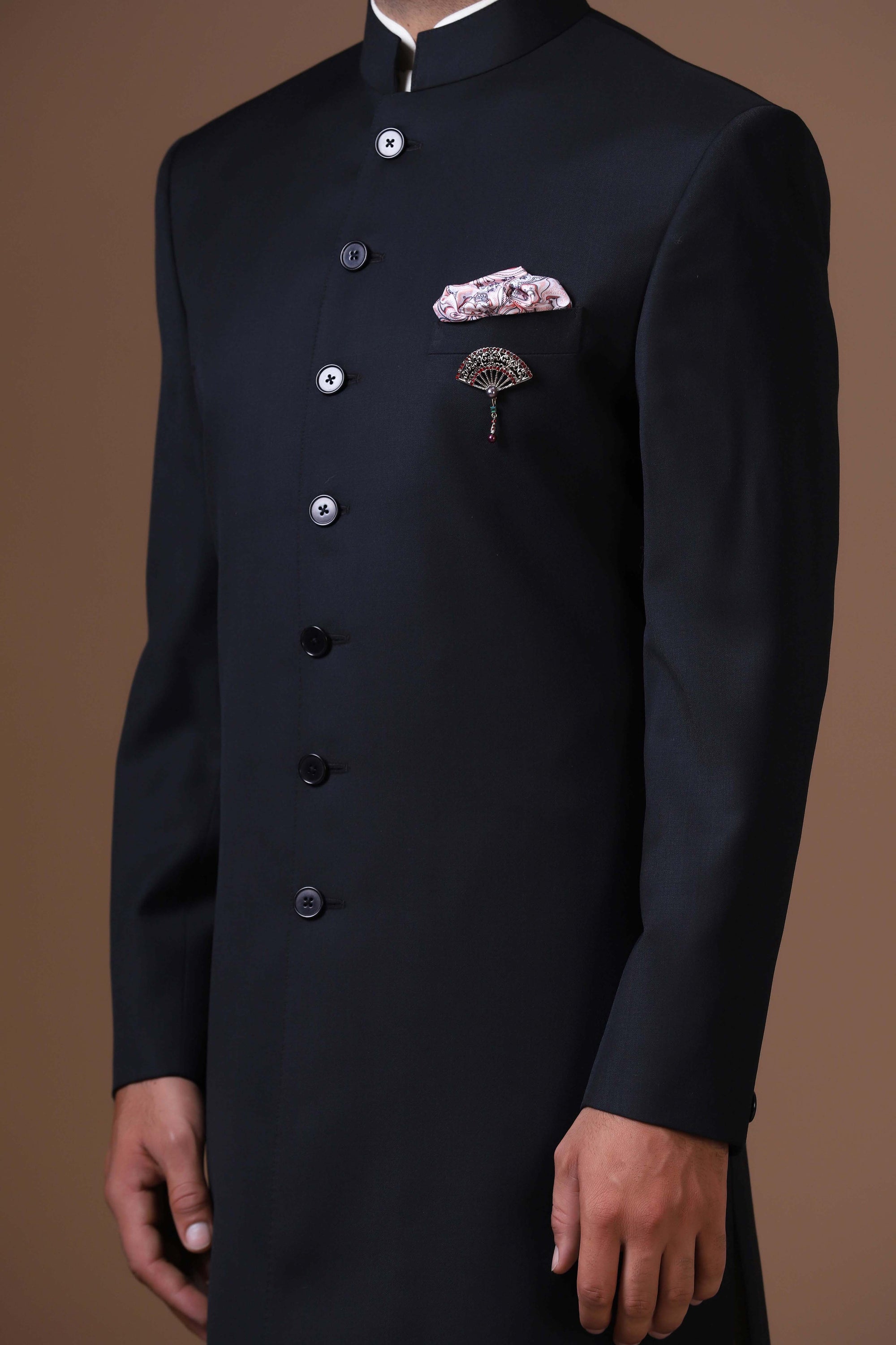 Our black Achkan, crafted from premium wool-rich fabric. Shop Now!