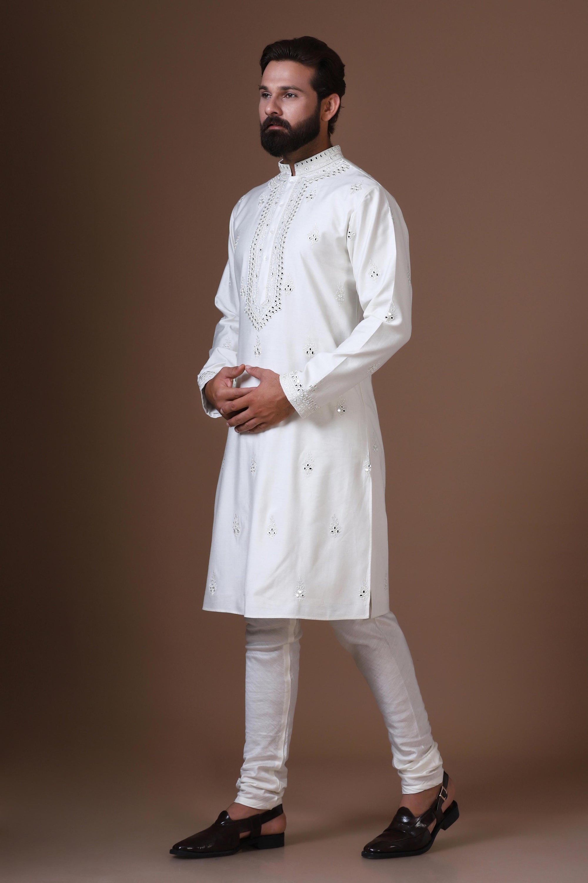 Enhance your style with our white embroidered Kurta Pajama. Shop Now!