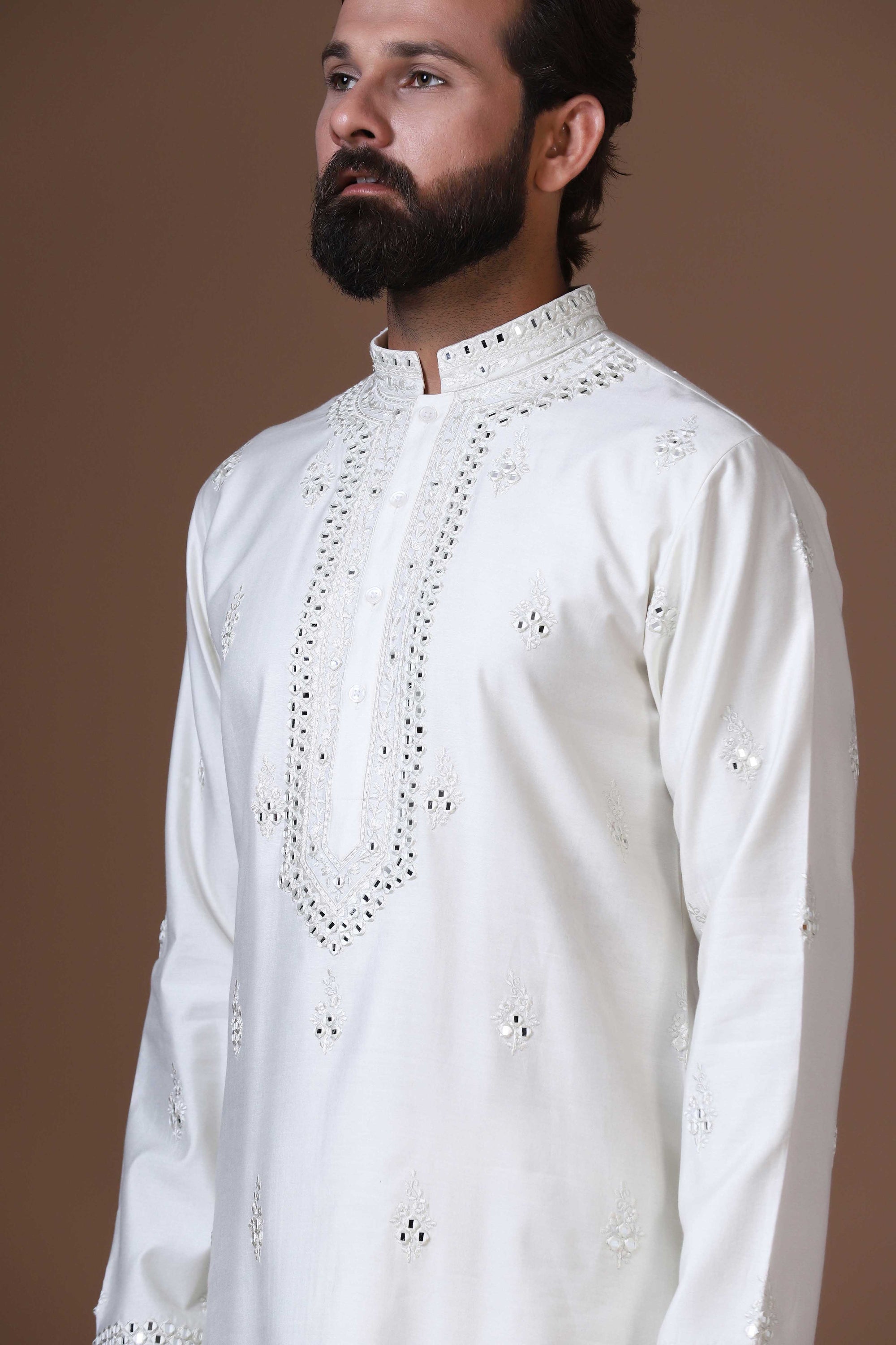 Enhance your style with our white embroidered Kurta Pajama. Shop Now!