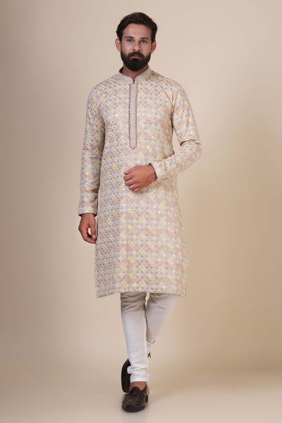 Embrace tradition and elegance in our multicolour Kurta Pajama, crafted from cotton fabric and adorned with exquisite chikankari embroidery across the body.