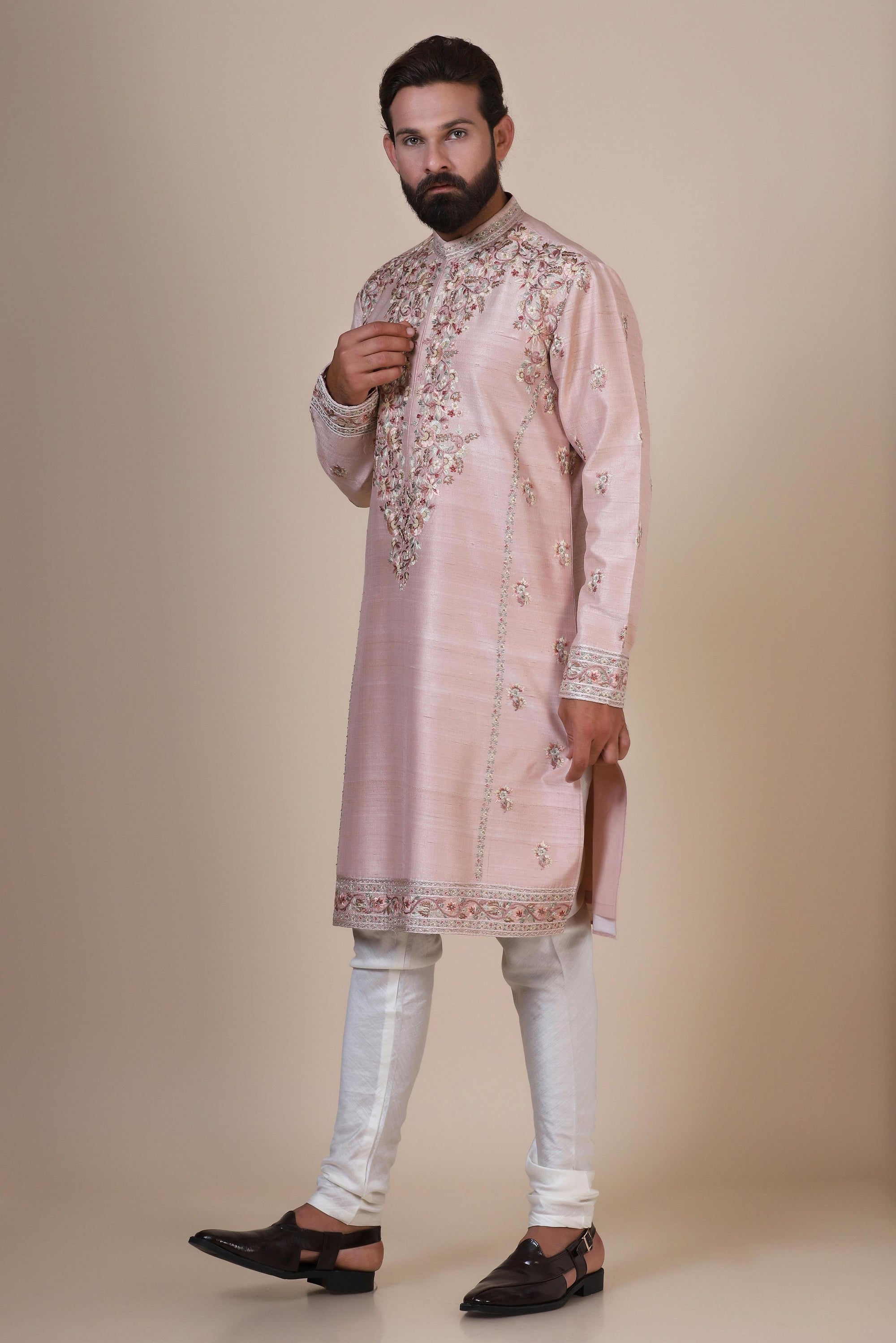 Indulge in elegance with our Pink Kurta, crafted from fine Raw-Silk fabric. Shop Now!