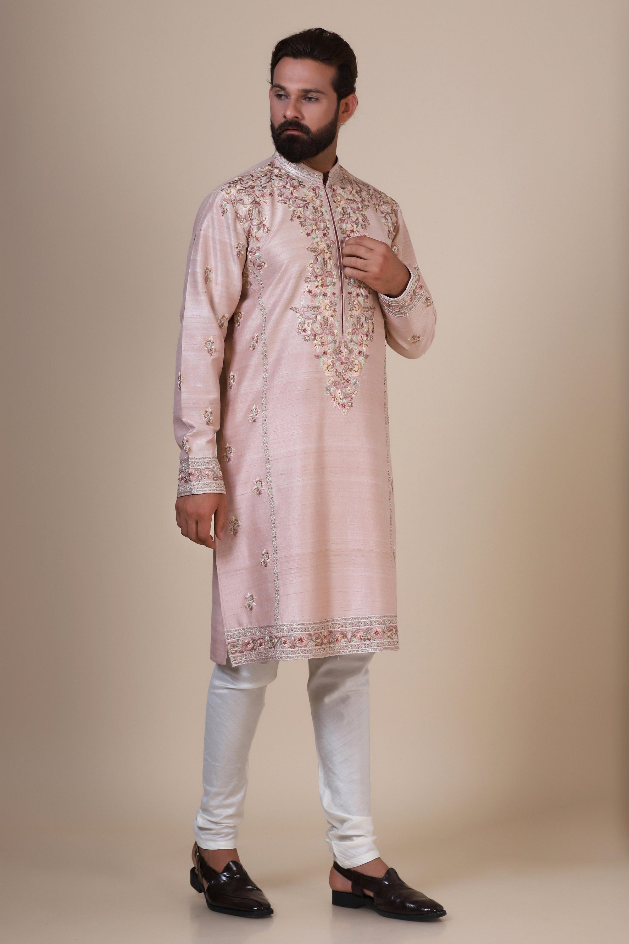 Indulge in elegance with our Pink Kurta, crafted from fine Raw-Silk fabric. Shop Now!
