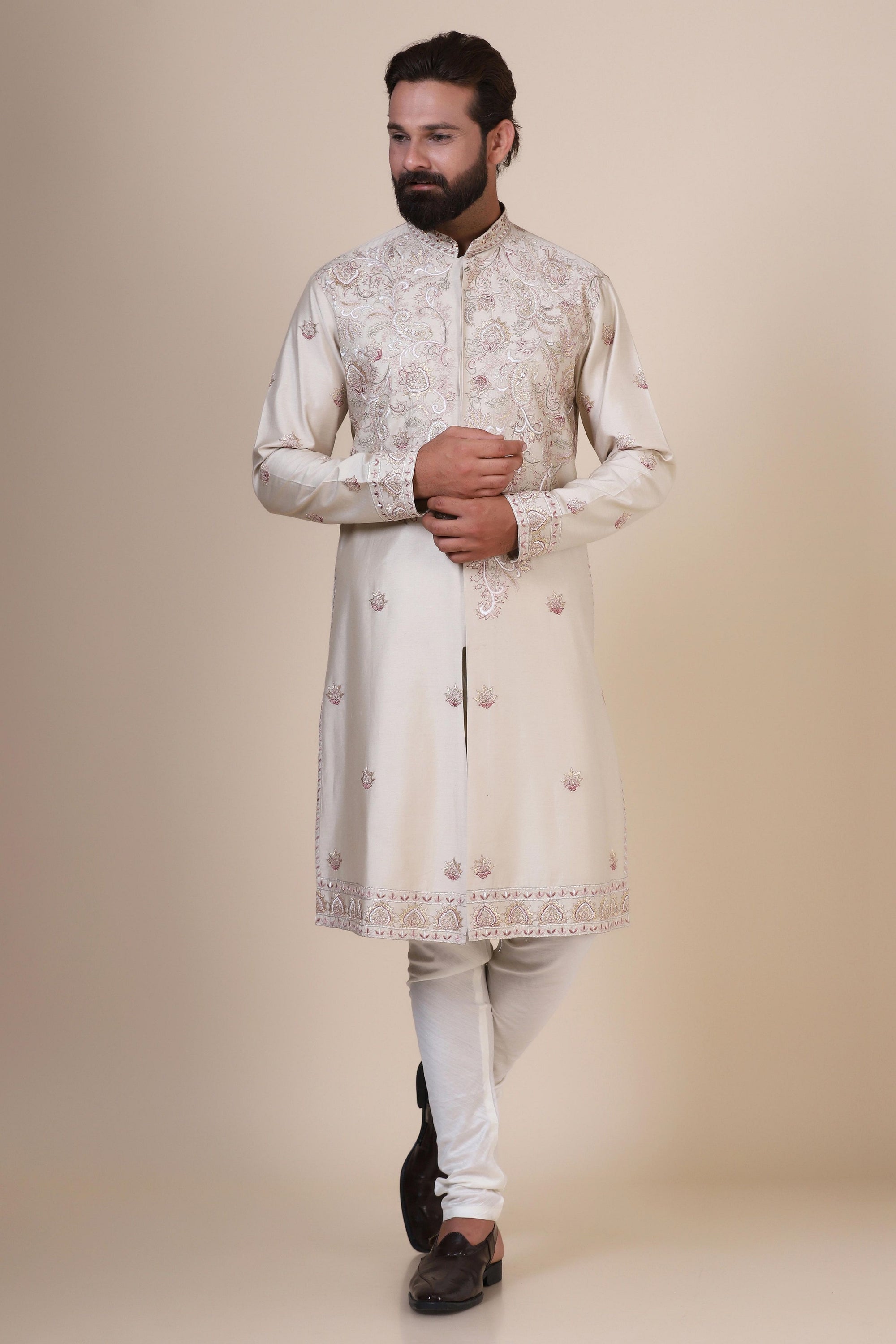 Elevate your style with our beige front open kurta, adorned with subtle tonal embroidery. Shop Now!