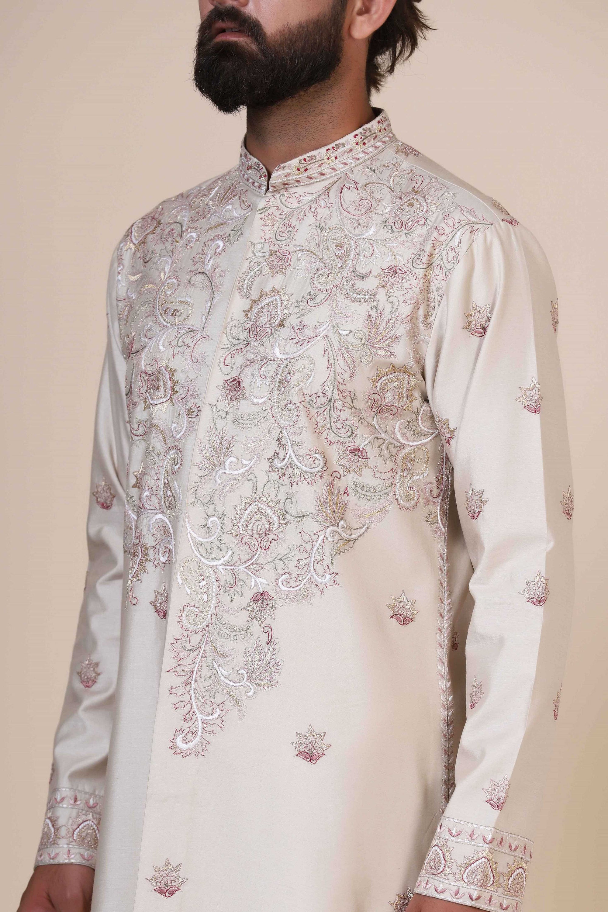 Elevate your style with our beige front open kurta, adorned with subtle tonal embroidery. Shop Now!
