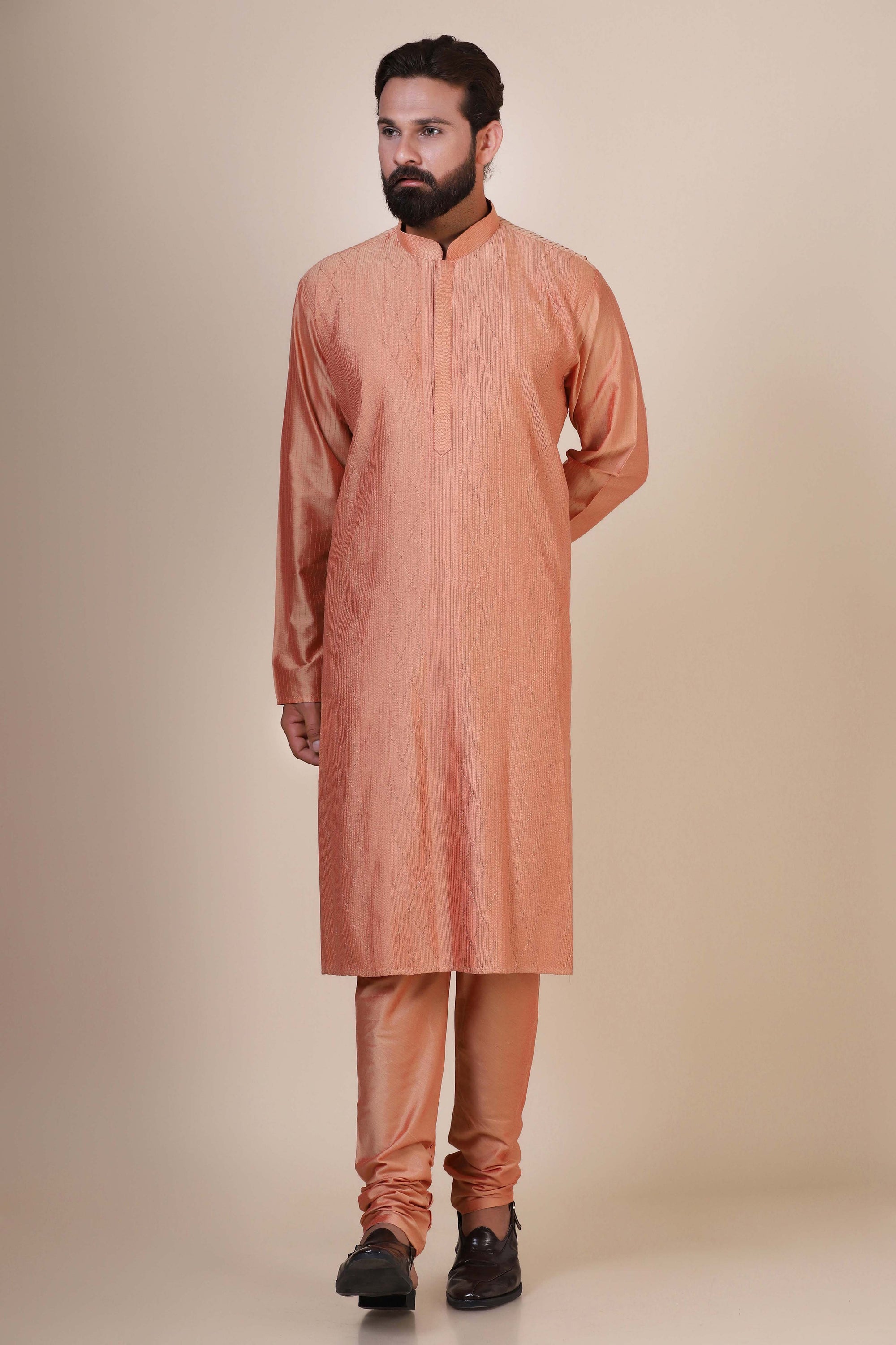 Embrace elegance and comfort in our Peach kurta pajama, tailored from blended cotton. Shop Now!