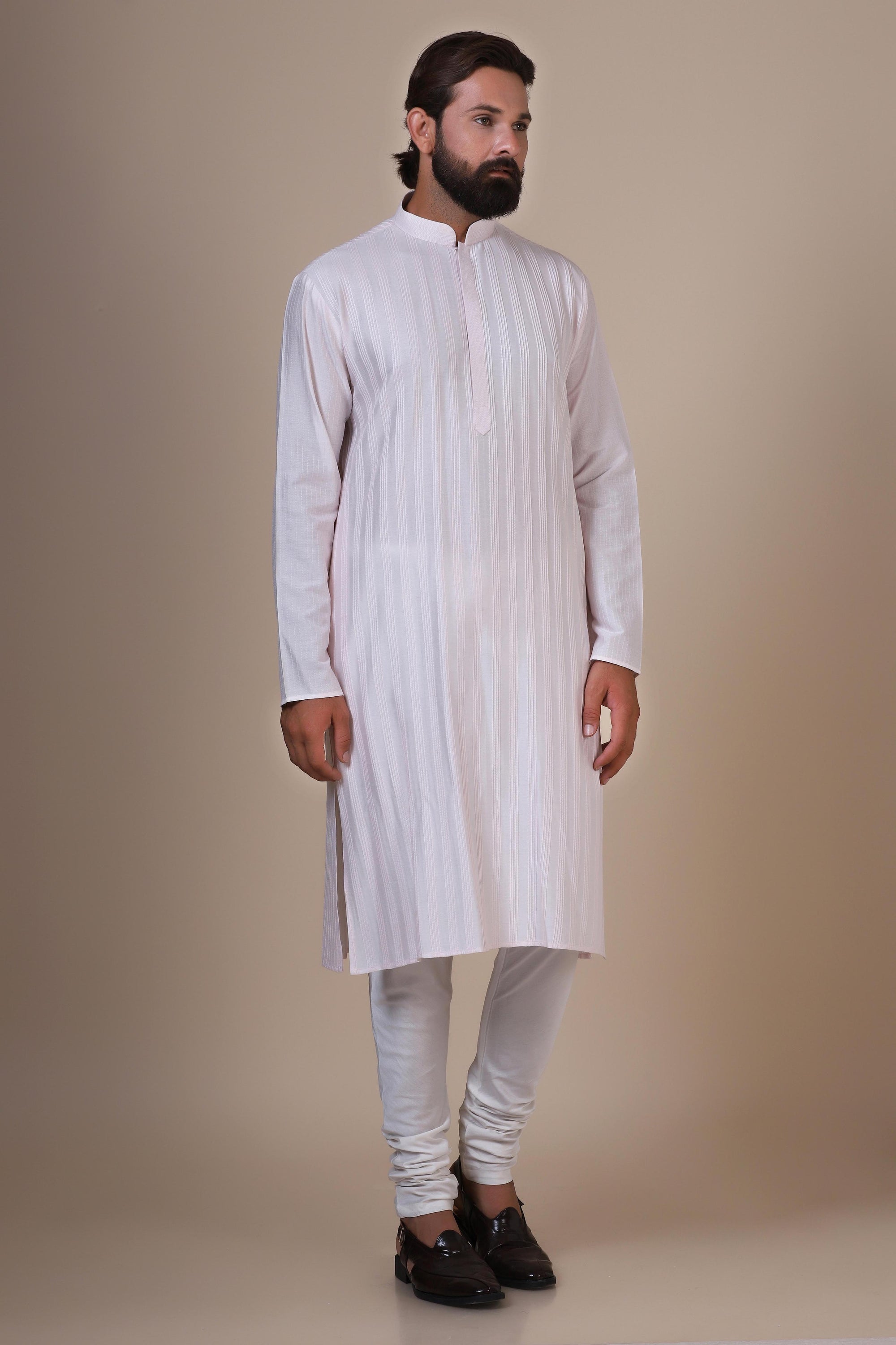 Step into comfort and style with our Pink kurta pajama, tailored from blended cotton. Shop Now!