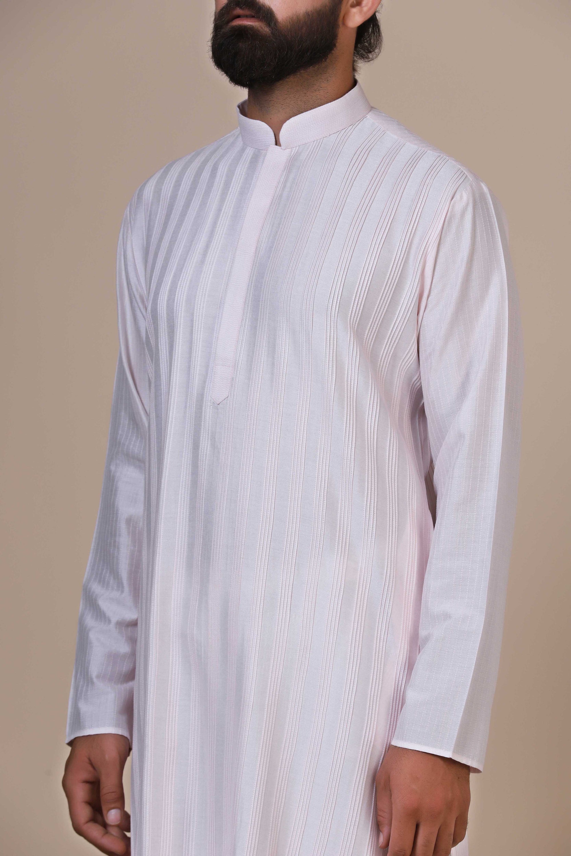 Step into comfort and style with our Pink kurta pajama, tailored from blended cotton. Shop Now!