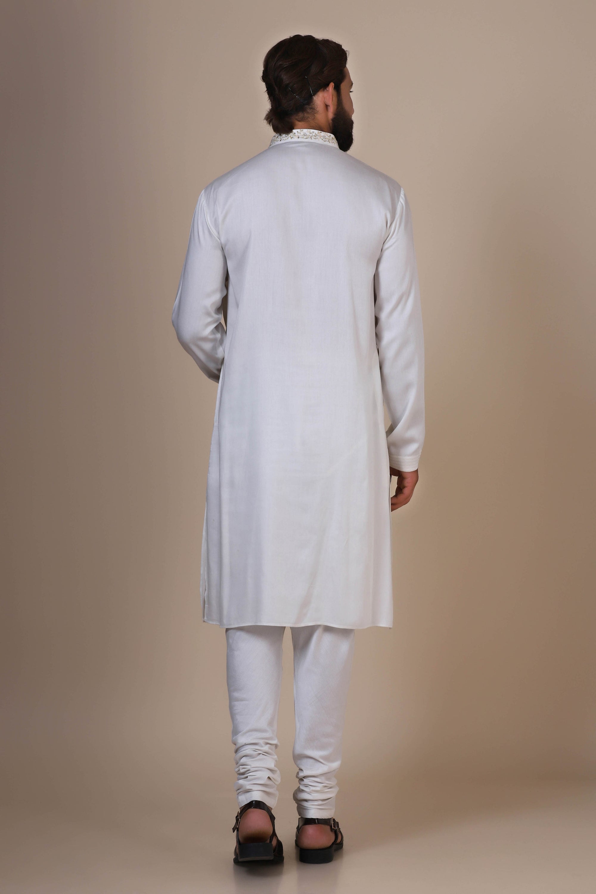 Experience comfort in our White kurta pajama, crafted from blended cotton and silk fabric. Shop Now!