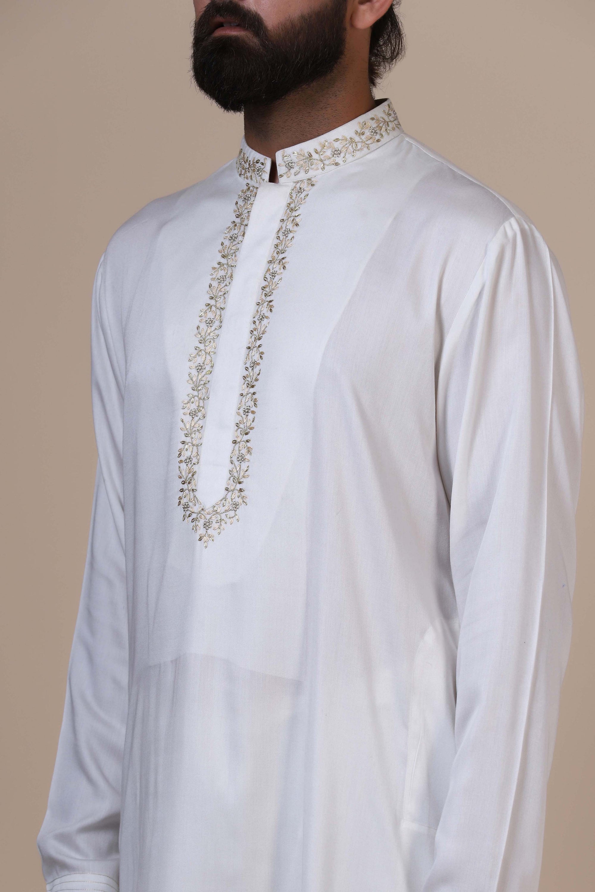Experience comfort in our White kurta pajama, crafted from blended cotton and silk fabric. Shop Now!