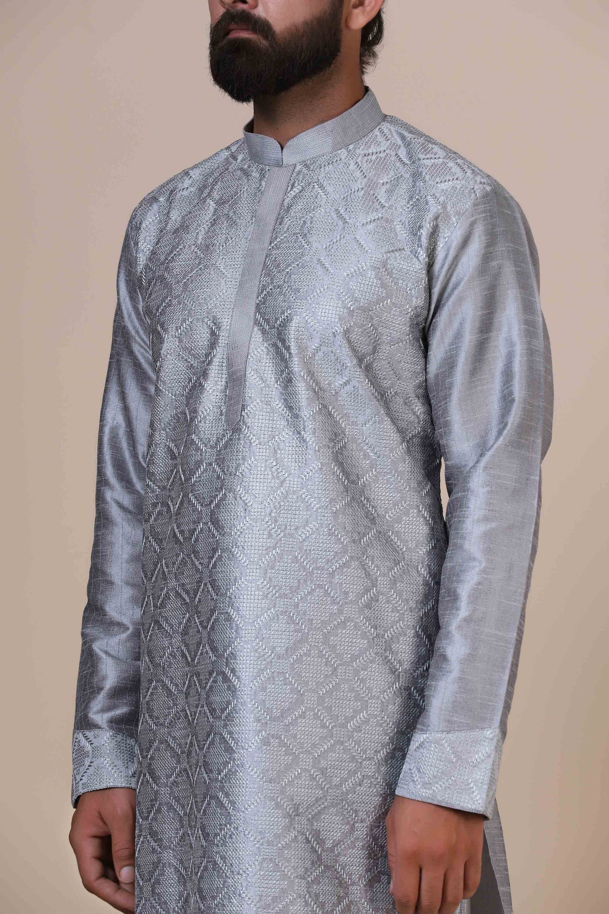 Indulge in with our Grey kurta pajama, crafted from blended cotton and silk fabric. Shop Now!