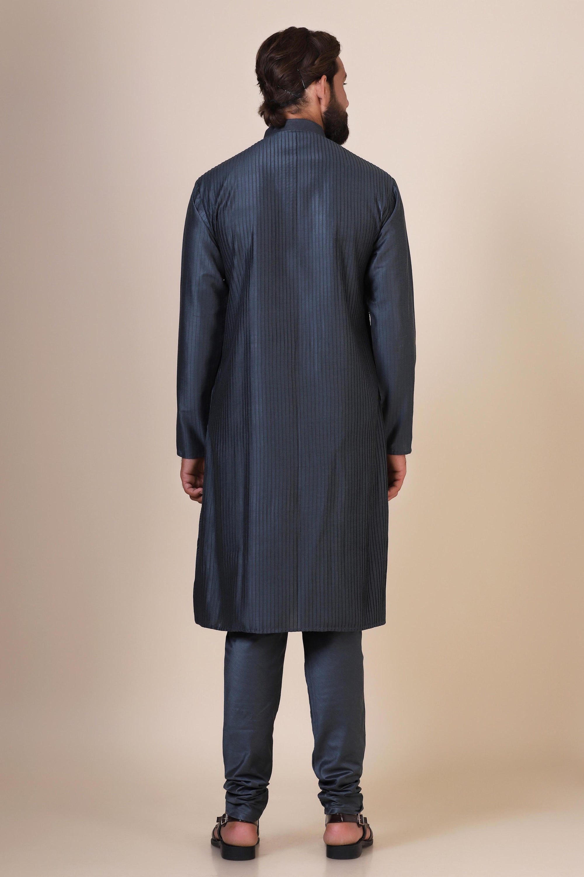 Wrap yourself with our Grey kurta pajama, tailored from blended cotton and silk fabric. Shop Now!