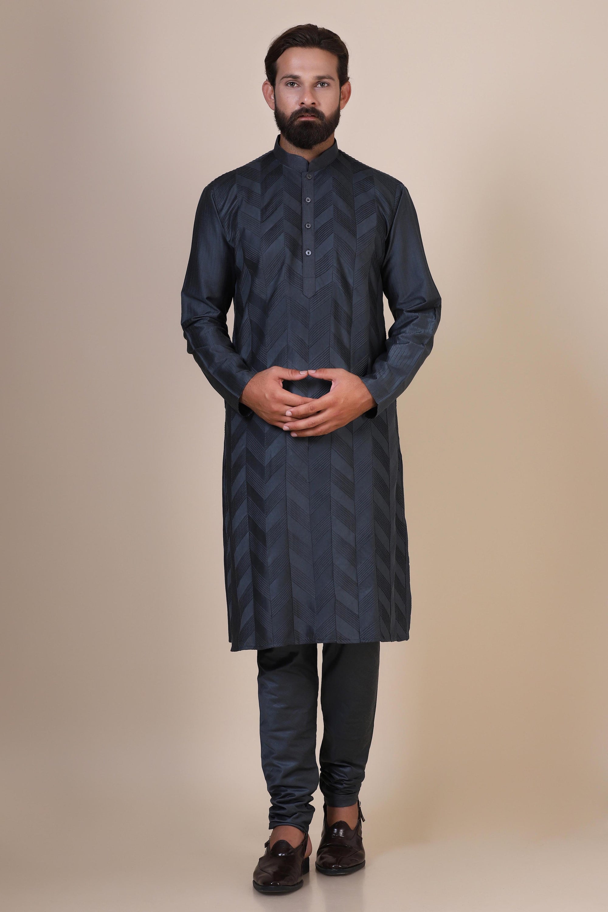 Wrap yourself with our Grey kurta pajama, tailored from blended cotton and silk fabric. Shop Now!