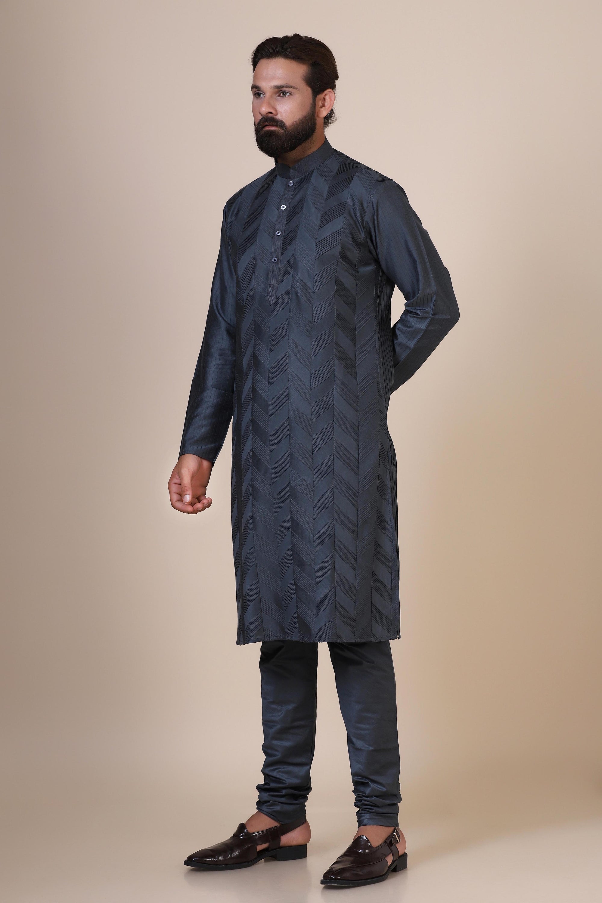 Wrap yourself with our Grey kurta pajama, tailored from blended cotton and silk fabric. Shop Now!