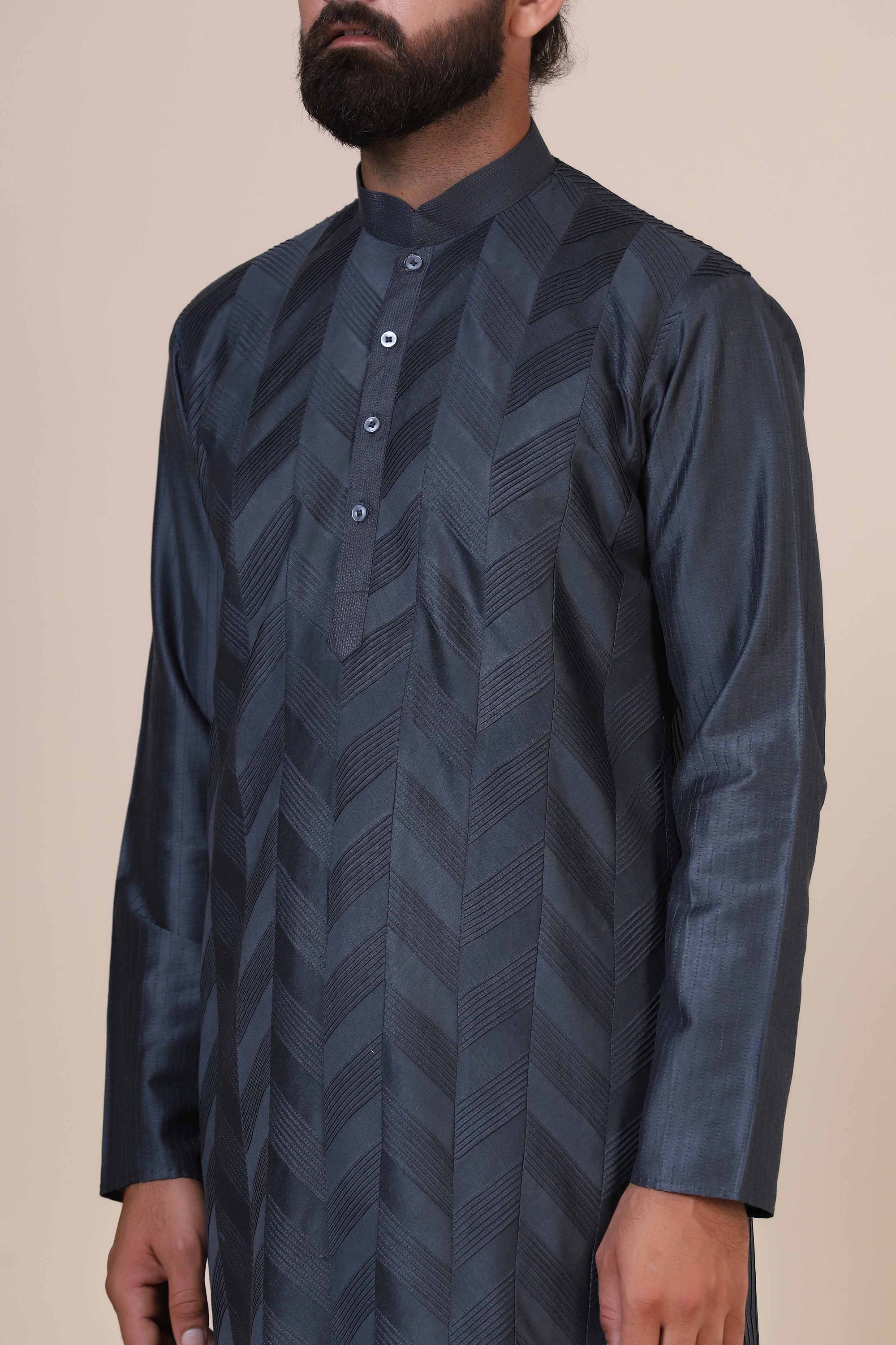 Wrap yourself with our Grey kurta pajama, tailored from blended cotton and silk fabric. Shop Now!