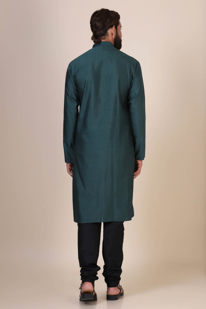 Experience comfort and radiance in our Green kurta pajama, crafted from blended cotton and silk fabric. Delicate zigzag Pintucks adorn the front, adding a touch of elegance.