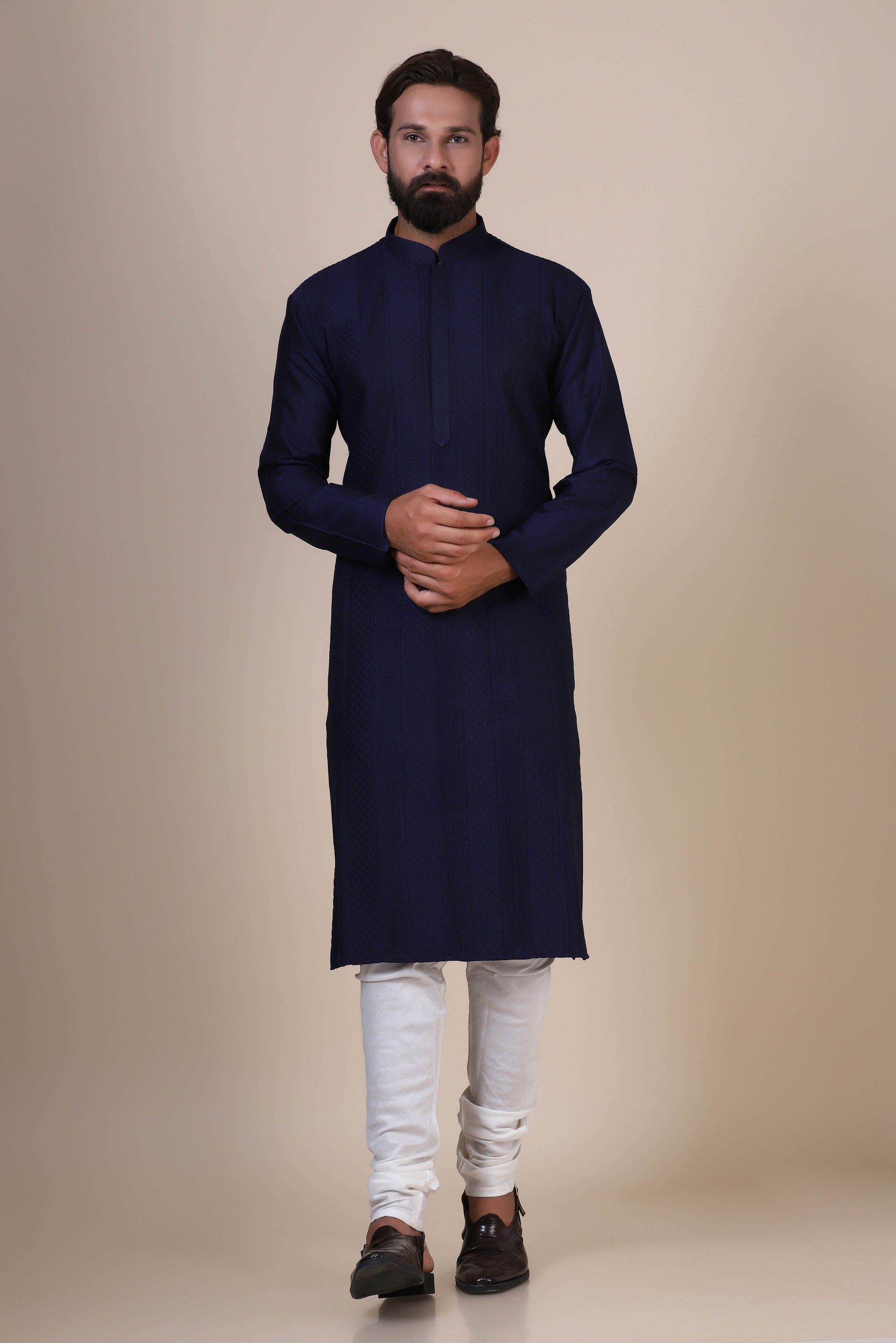 Indulge in comfort with Navy kurta pajama, crafted from blended cotton and silk fabric. Shop Now!