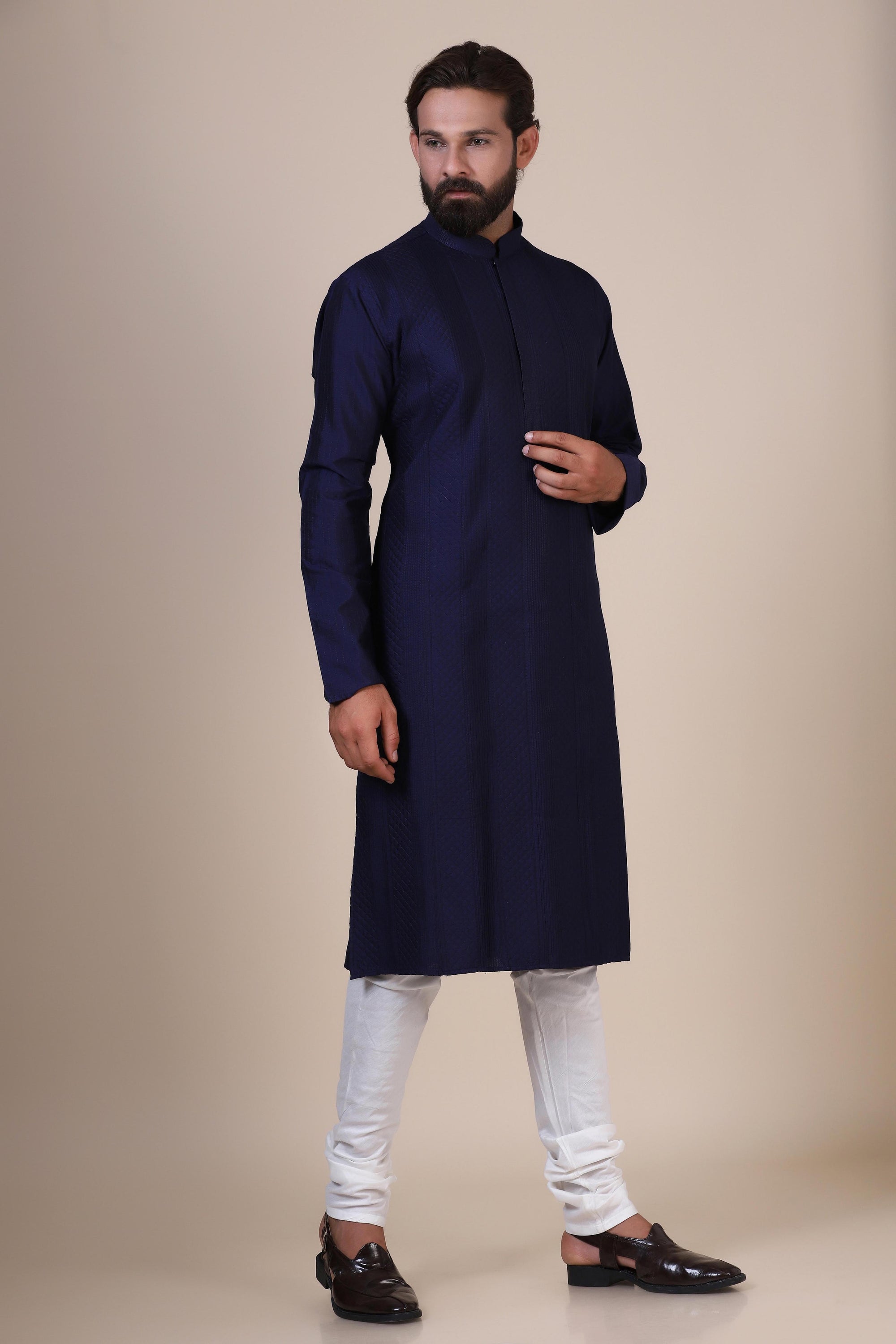 Indulge in comfort with Navy kurta pajama, crafted from blended cotton and silk fabric. Shop Now!