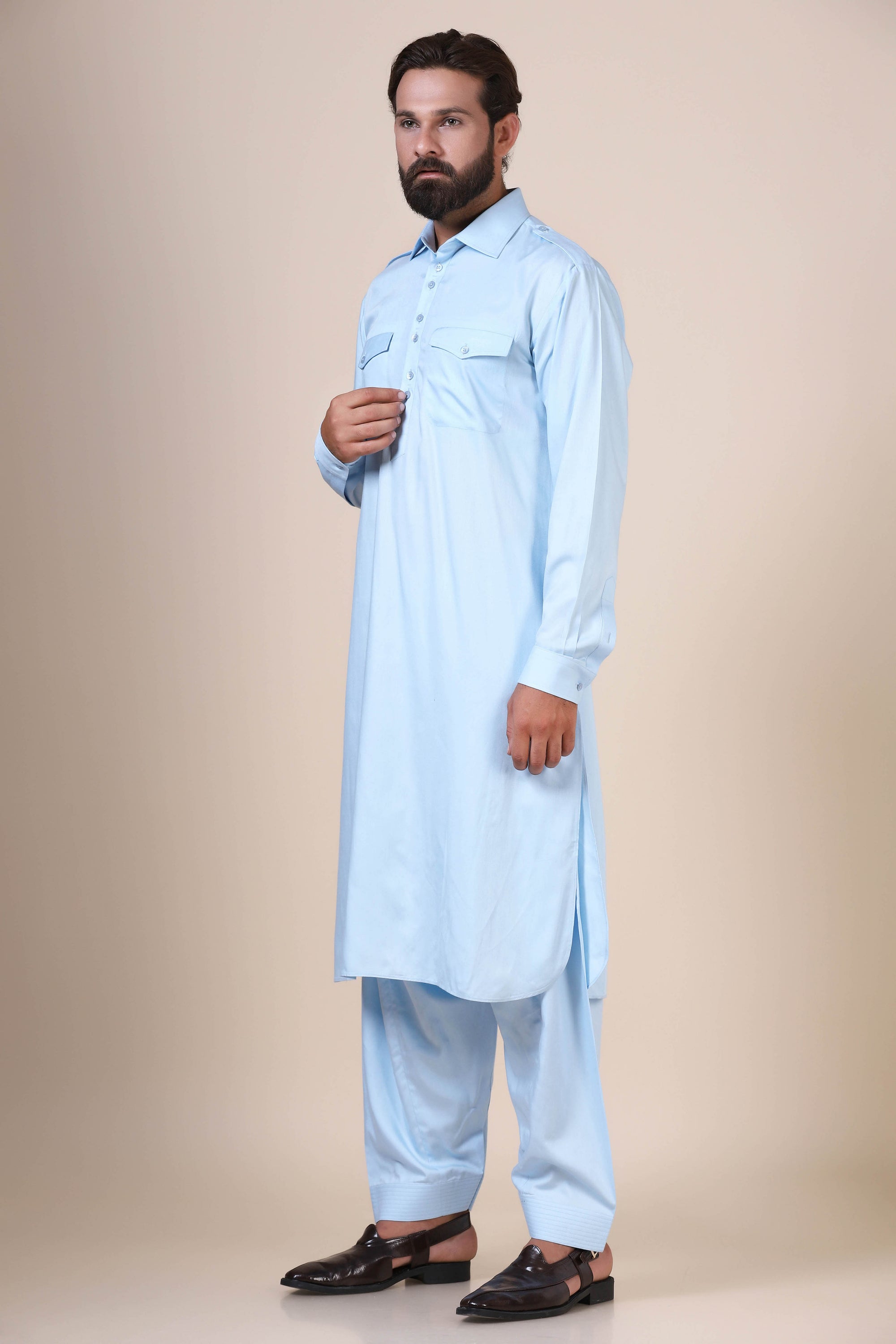 Elevate your style with this Light Blue pathani suit, tailored from flowing modal fabric. Shop Now!