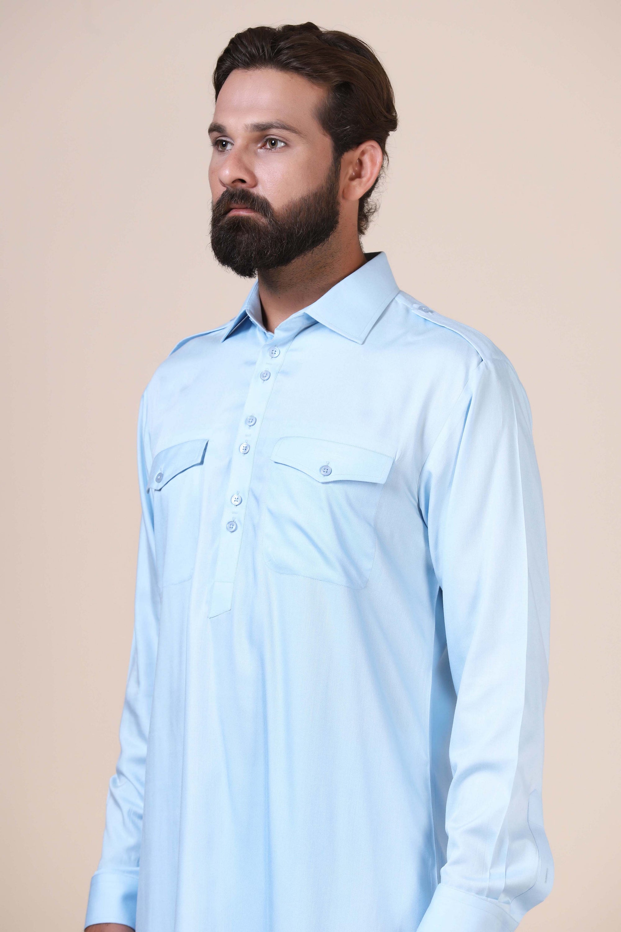 Elevate your style with this Light Blue pathani suit, tailored from flowing modal fabric. Shop Now!
