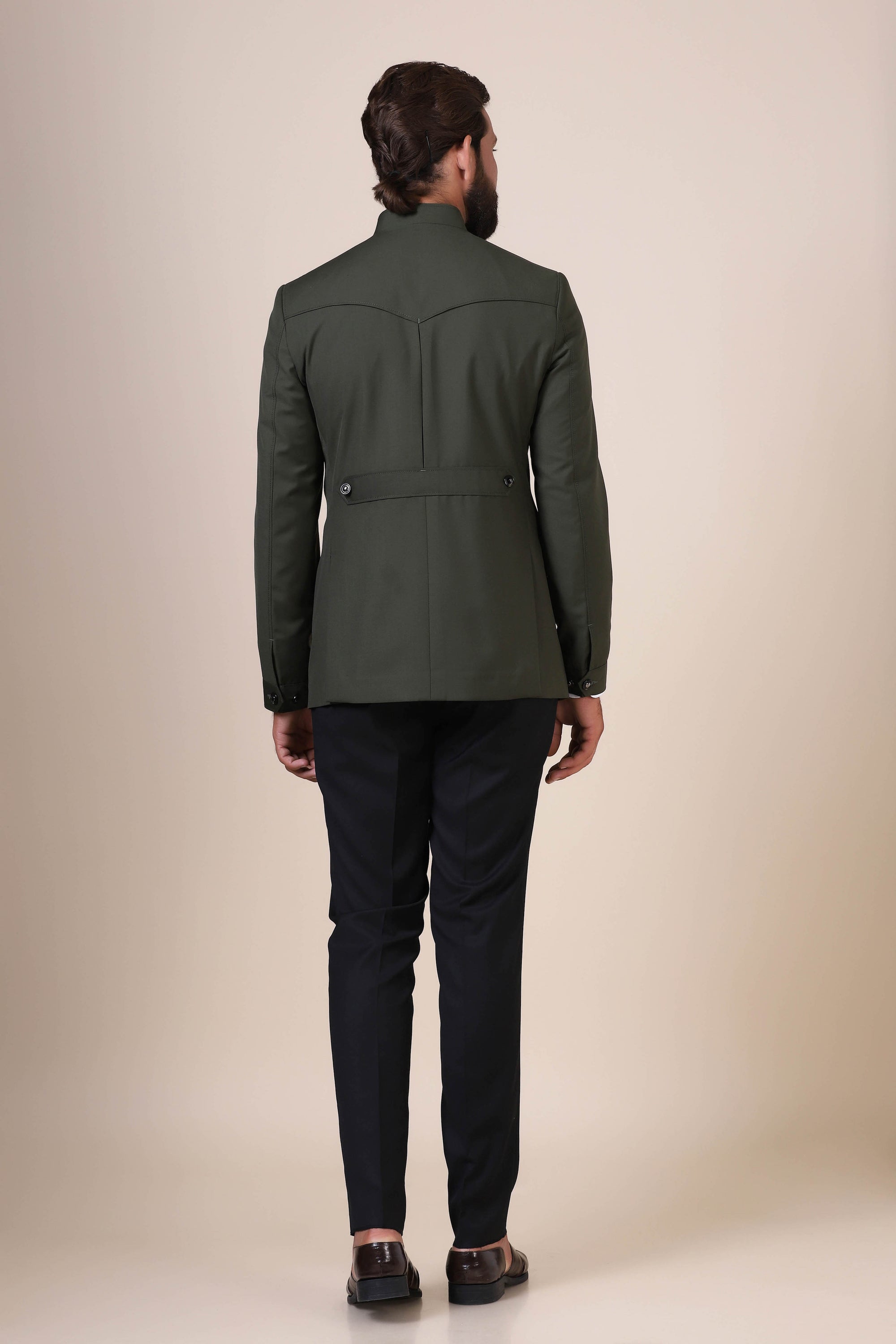 Dress with elegance in our Olive Bandhgala suit, crafted from all-wool fabric. Shop Now!