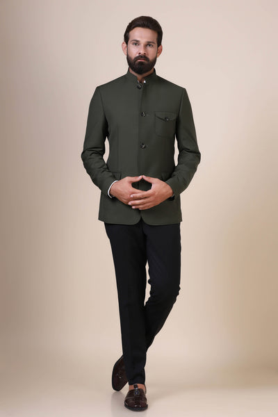 Dress with elegance in our Olive Bandhgala suit, crafted from all-wool fabric. Inspired by the safari jacket, featuring patch pockets with operational flaps for a timeless look.