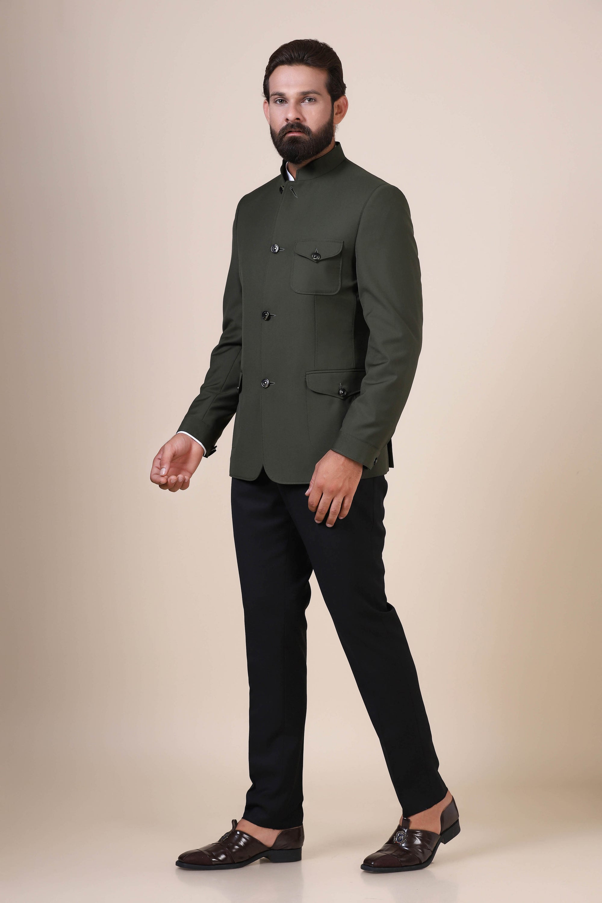 Dress with elegance in our Olive Bandhgala suit, crafted from all-wool fabric. Shop Now!