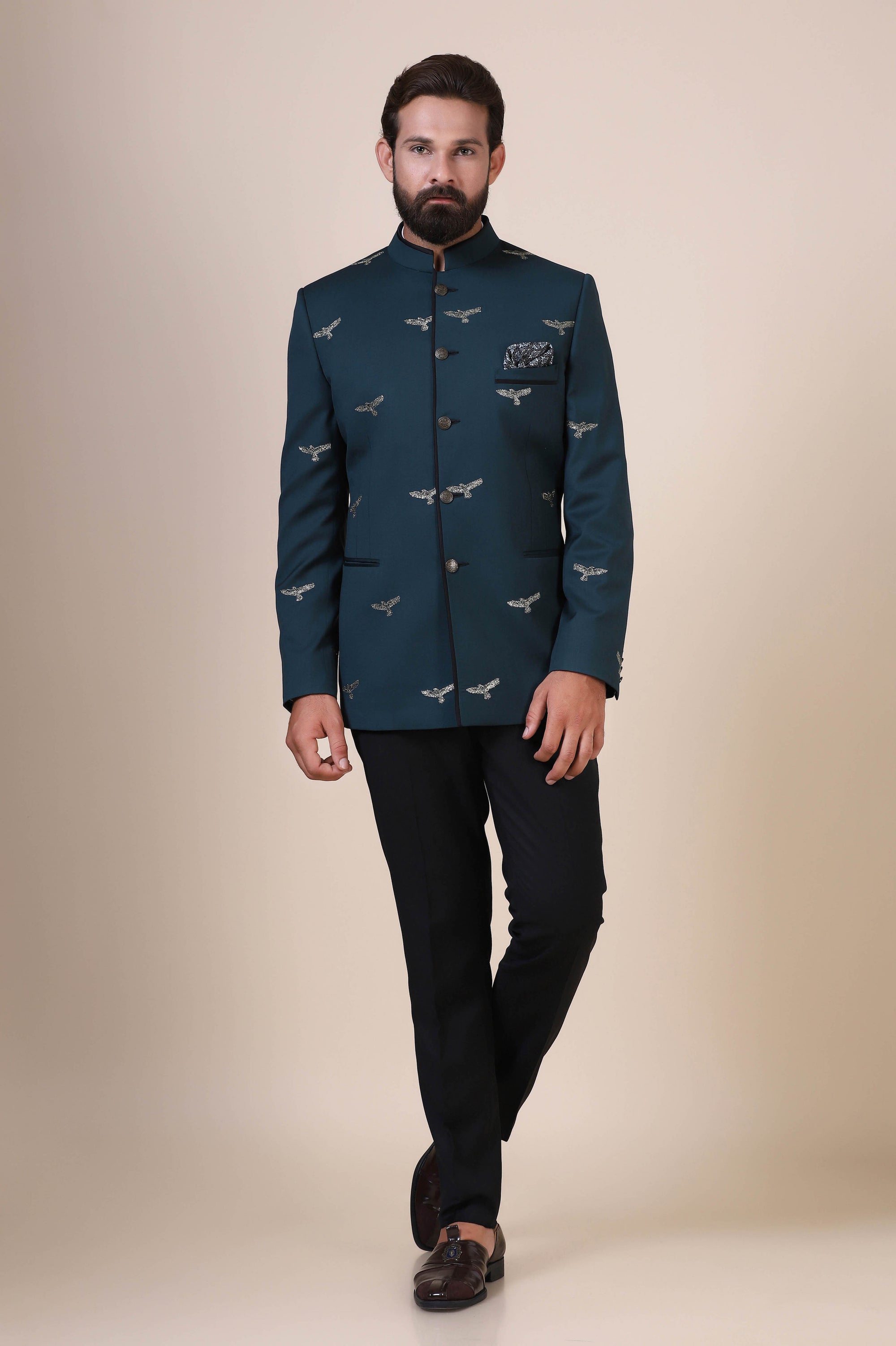 Elevate your style with our Teal Bandhgala suit, tailored from pure wool fabric. Shop Now!