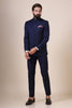 Elevate your style with our basic Navy bandhgala suit, crafted from all-weather wool-rich fabric. Classic design with 5 buttons, double vents at the back, and a straight-line cut in the front.