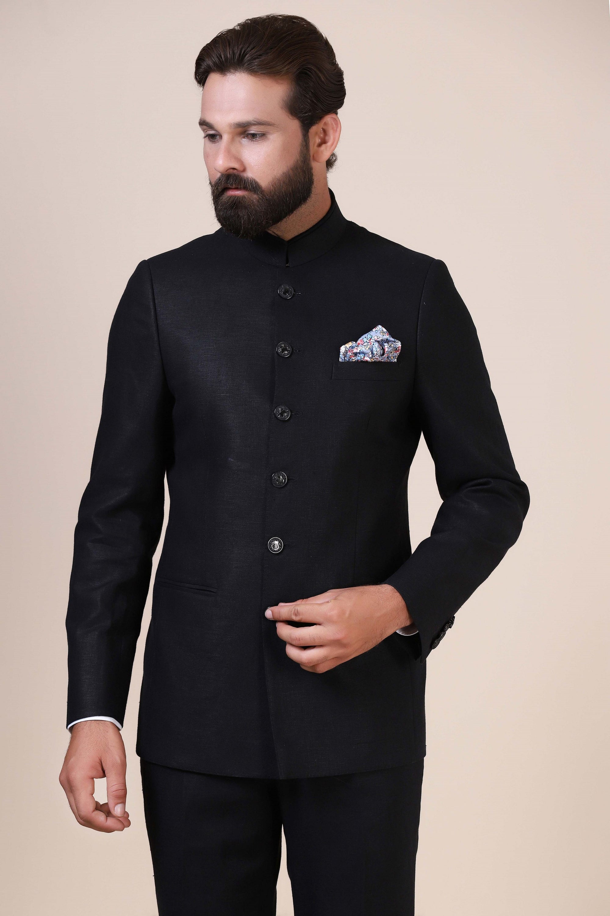 Dress elegantly in our basic Black bandhgala suit, tailored from 100% Irish Linen fabric. Shop Now!