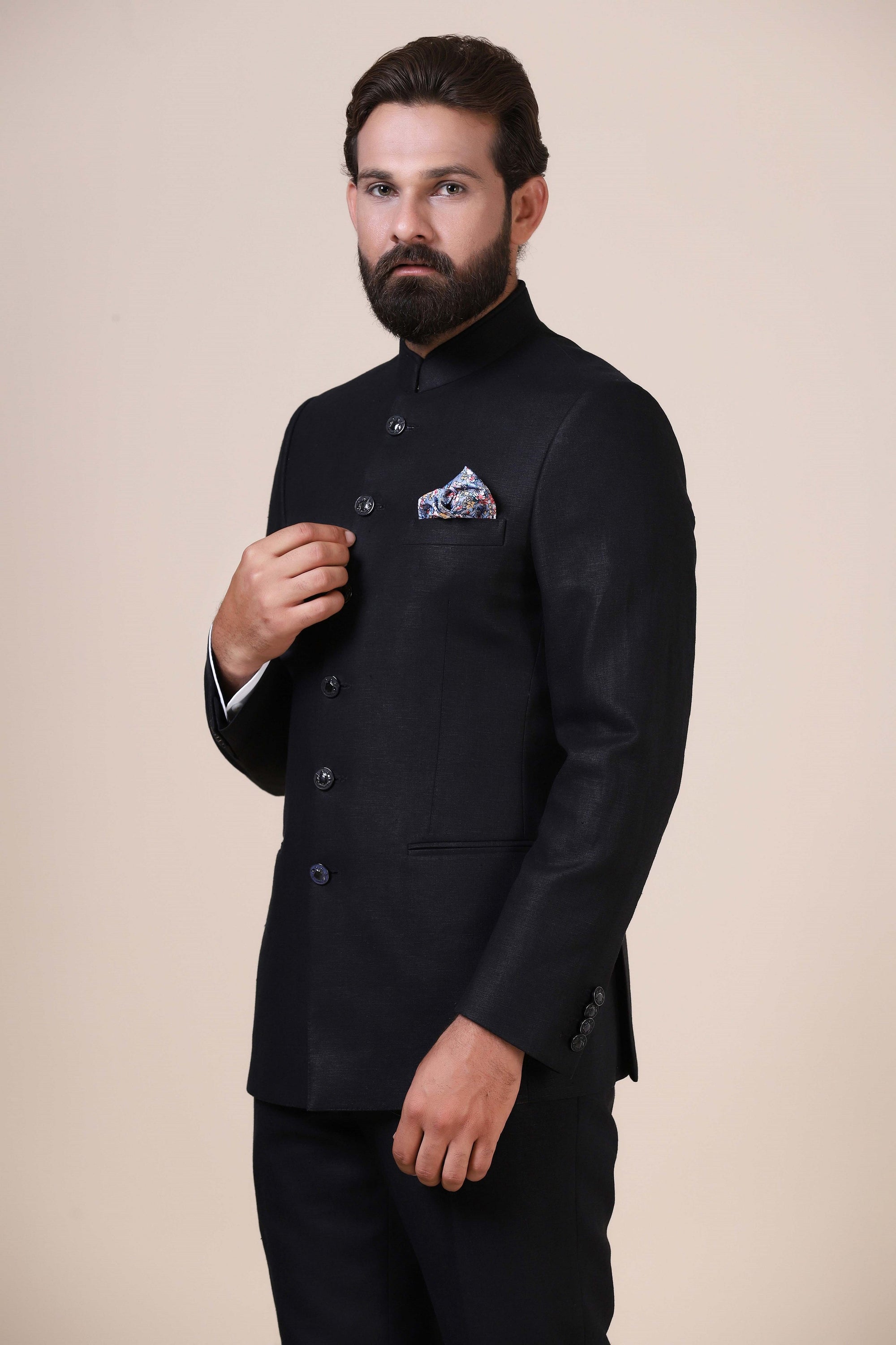 Dress elegantly in our basic Black bandhgala suit, tailored from 100% Irish Linen fabric. Shop Now!