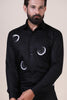 Elevate your look with our black shirt featuring contrast crescent moon embroidery on the front. Regular collar, black buttons for understated elegance.