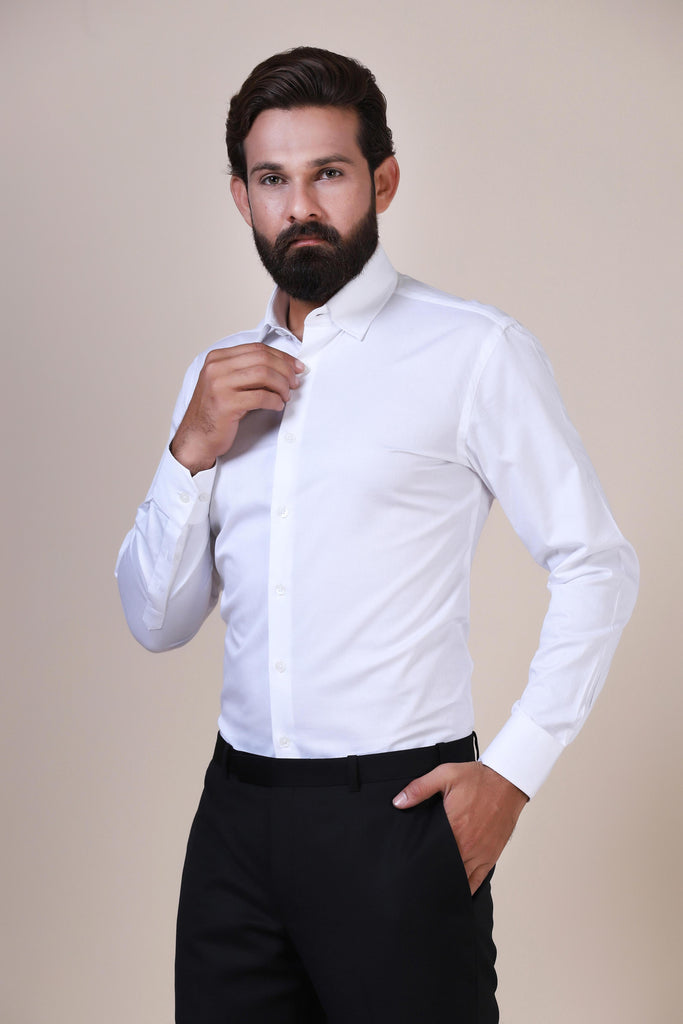 Elevate your essentials with our 100% cotton white shirt. Complete with a concealed button-down collar and French placket for timeless sophistication.