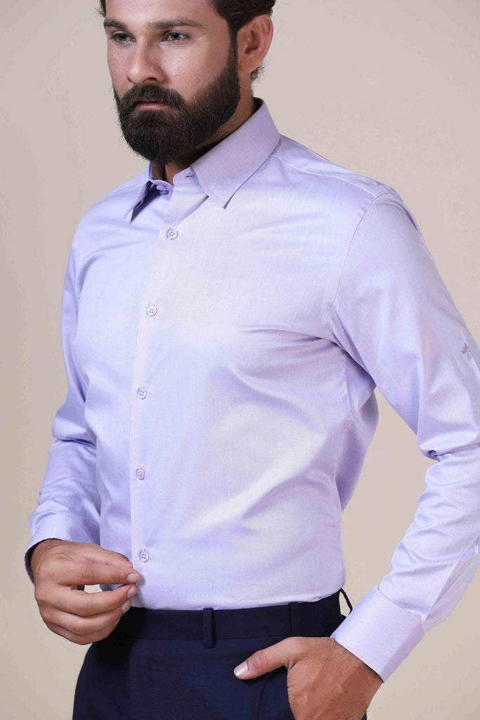 Add a touch of sophistication with our 100% cotton light purple shirt. Concealed button-down collar and French placket for effortless elegance.