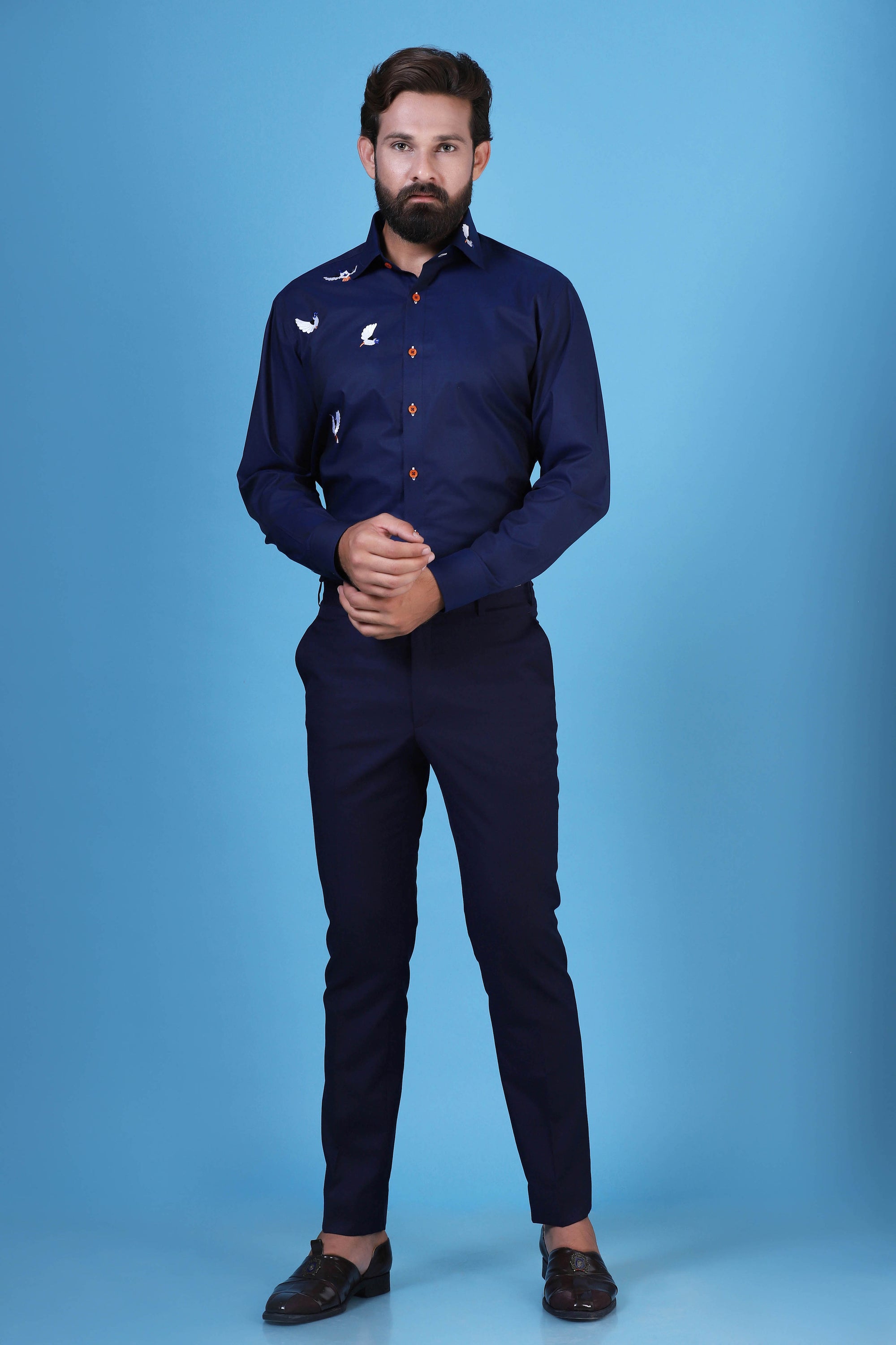 Classic navy embroidered shirt to elevate your style. Shop Now!