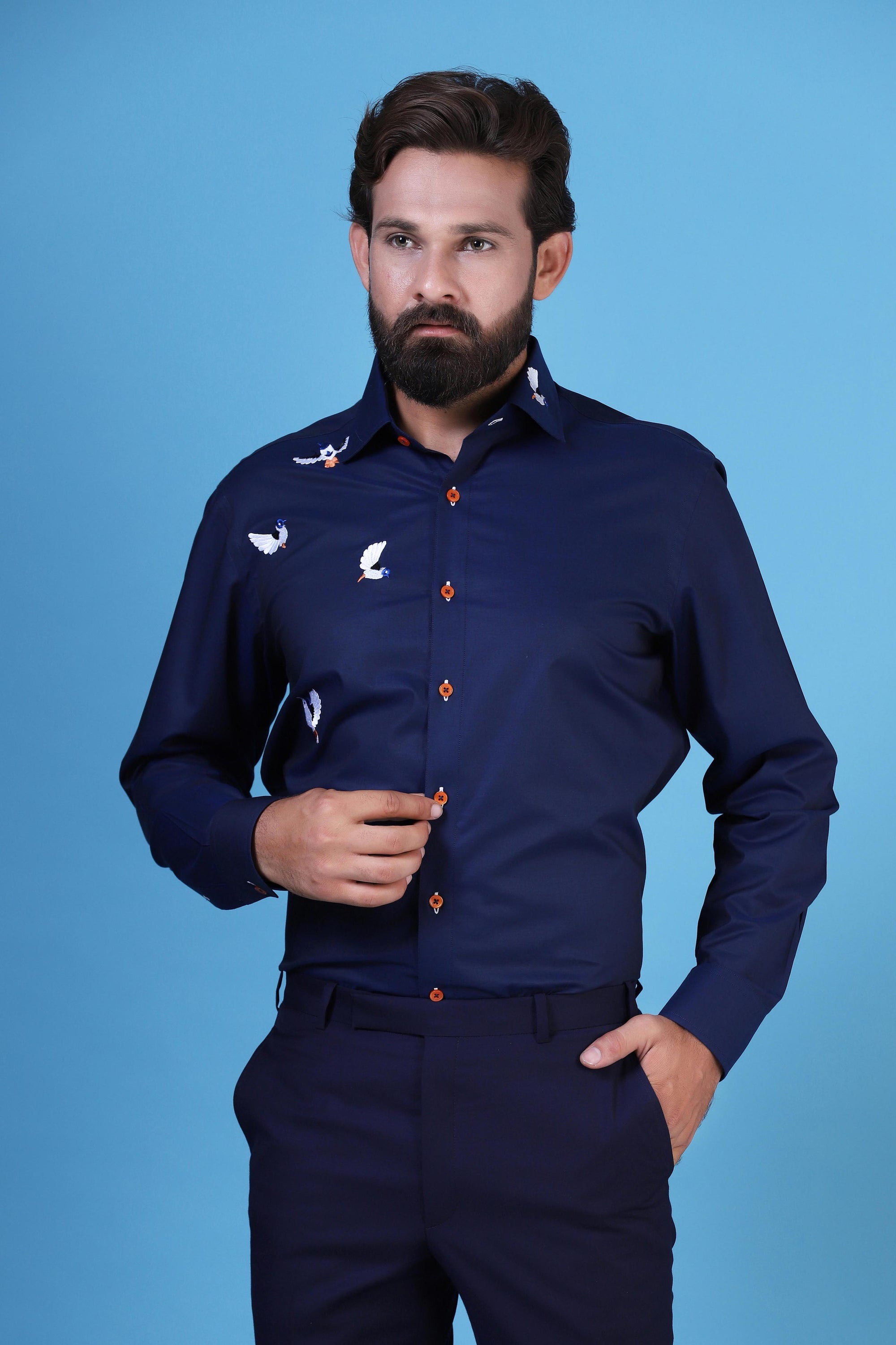 Classic navy embroidered shirt to elevate your style. Shop Now!