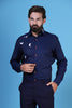 Elevate your style with our navy shirt adorned with embroidered birds on the left. Complete with a regular collar and matching buttons for a polished look.