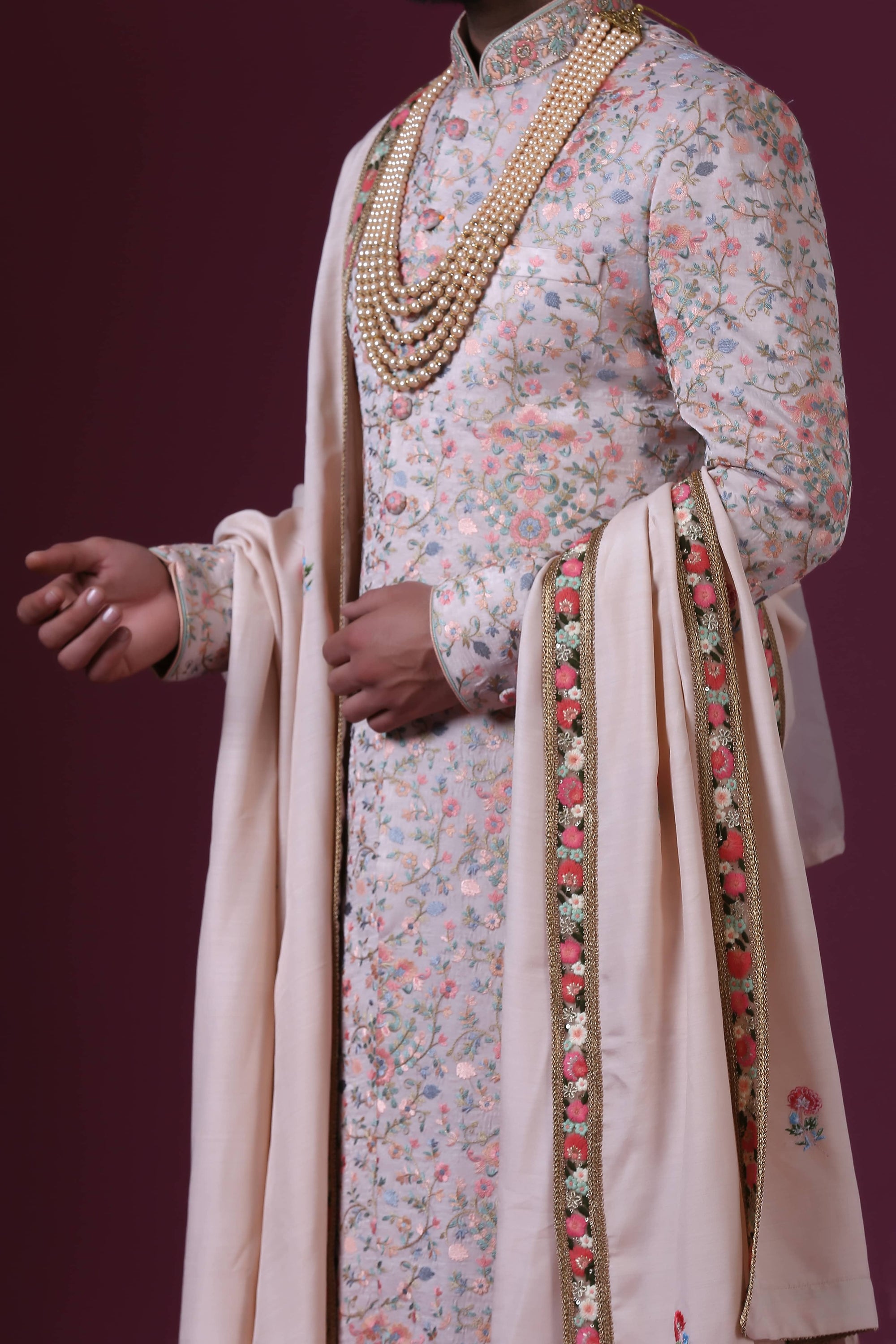 Charm in white with multicolor floral embroidery, exuding soft pastel elegance. Shop Now!