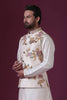 Exude elegance in our Ivory Nehru jacket with delicate floral embroidery, paired flawlessly with matching kurta pajama. Ideal for daytime weddings, a must-have for grooms.