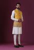 Indulge in exclusivity with our Haldi-colored Nehru Jacket set. Intricately adorned with Kiran Dori embroidery, crafted over 10 hours by our skilled artisans.