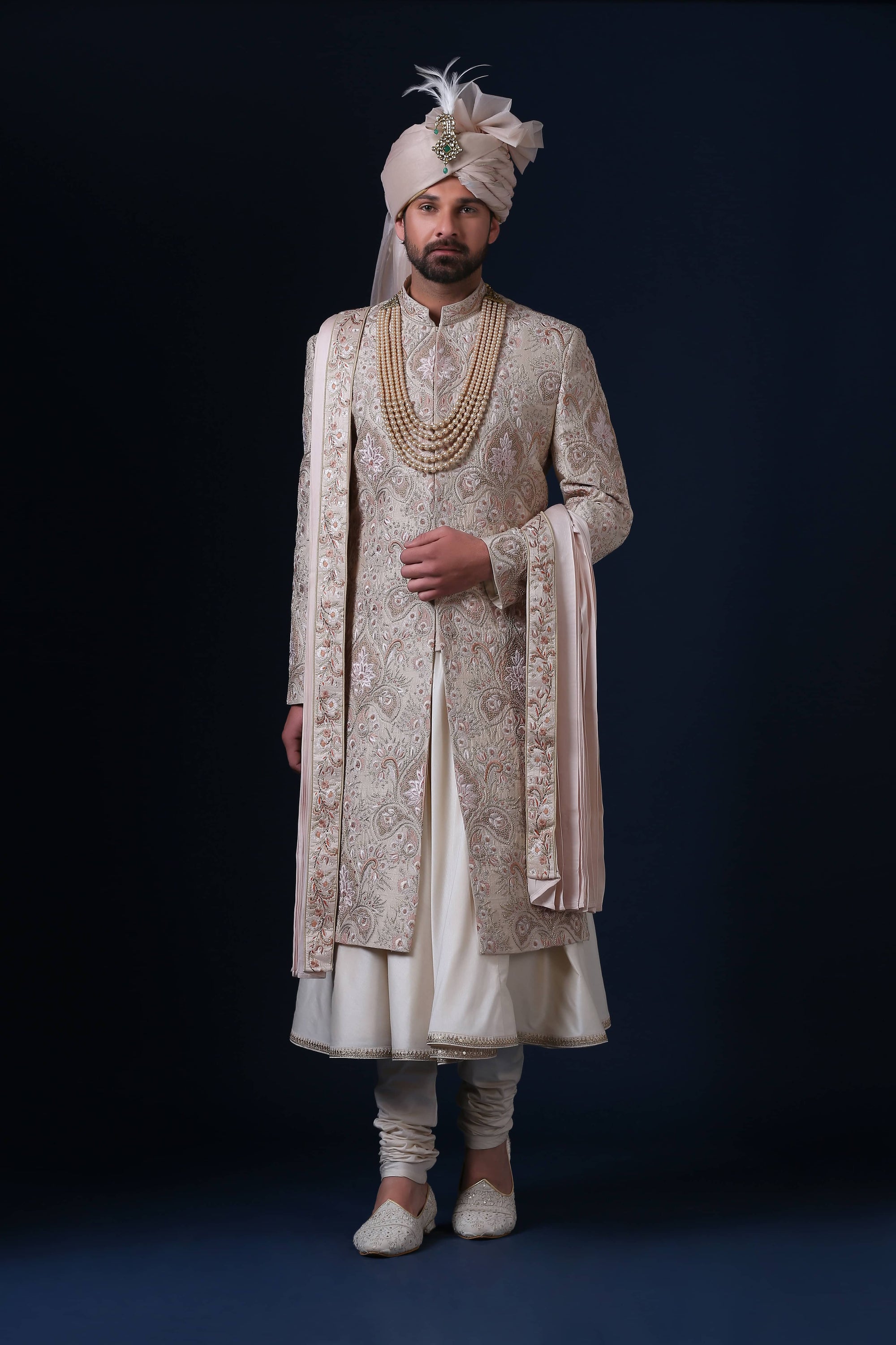 Elevate your style with this sherwani ensemble, complete with kurta pajama. Shop Now!