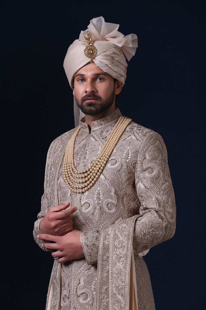 Experience luxury with our best-selling sherwani, featuring panelled patch-work. Shop Now!