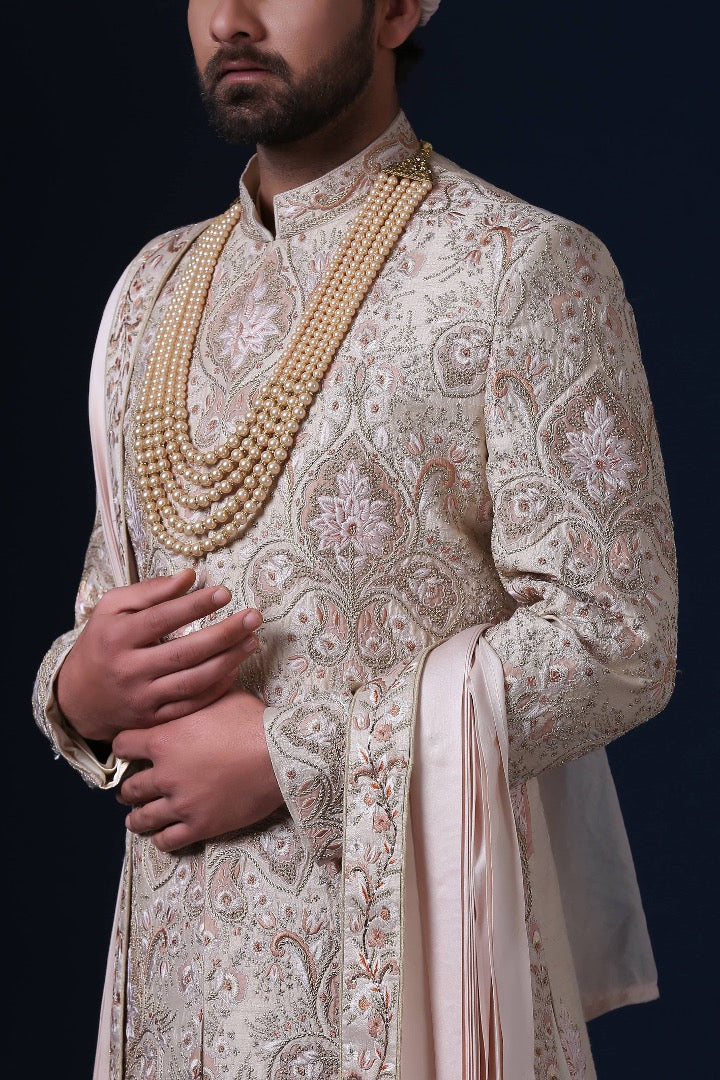 Elevate your style with this sherwani ensemble, complete with kurta pajama. Shop Now!