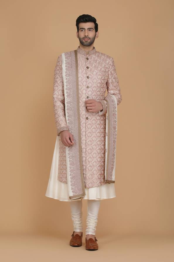This Indowestern is highlighted by subtle off-white thread embroidery all across the body. Shop Now!