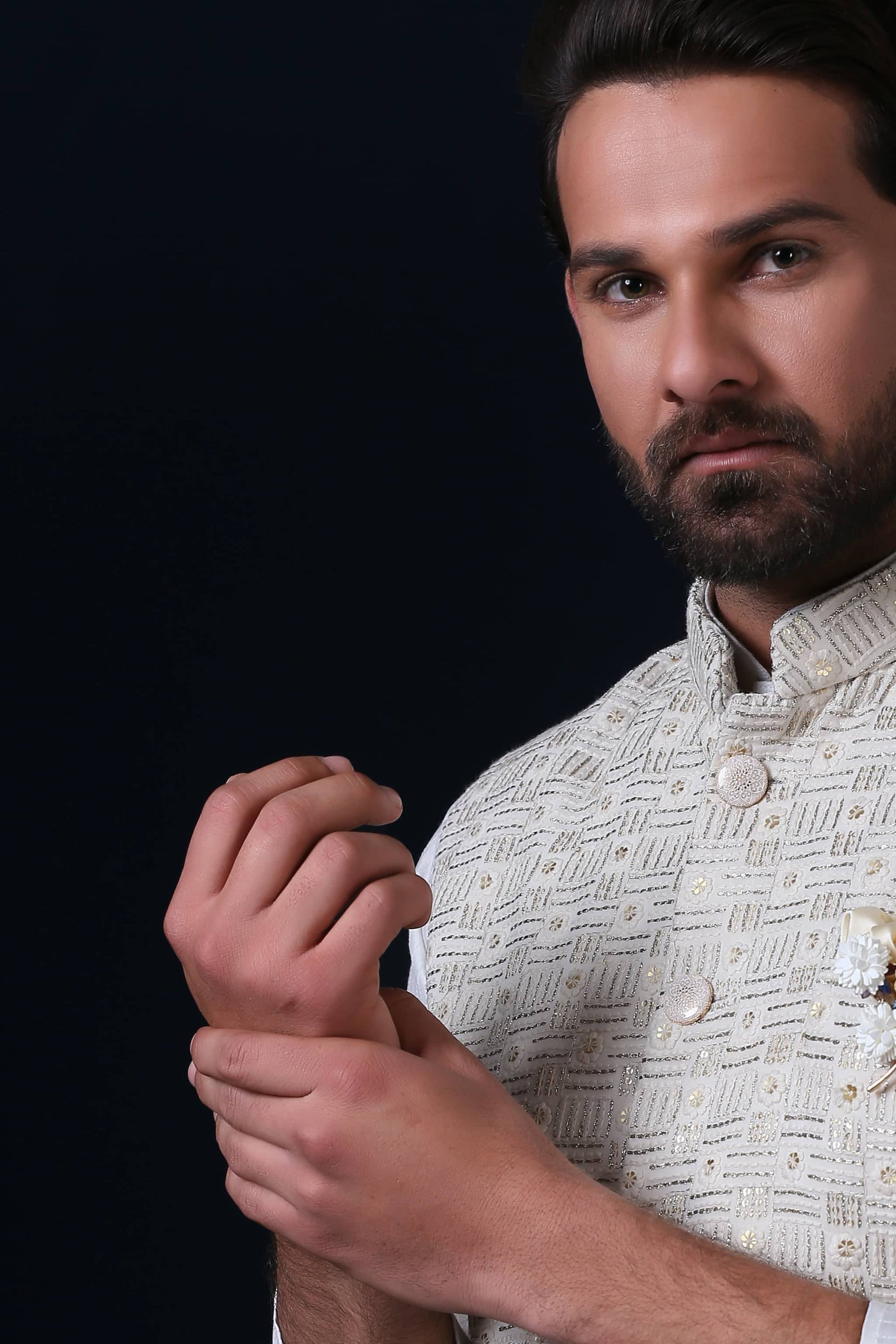 Crafted from luxurious silk jacquard, this jacket shines with pearl-finish buttons. Shop Now!